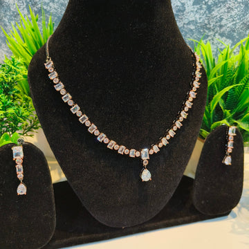 Neckline with Heavy Shining Diamonds and Sleek Earrings